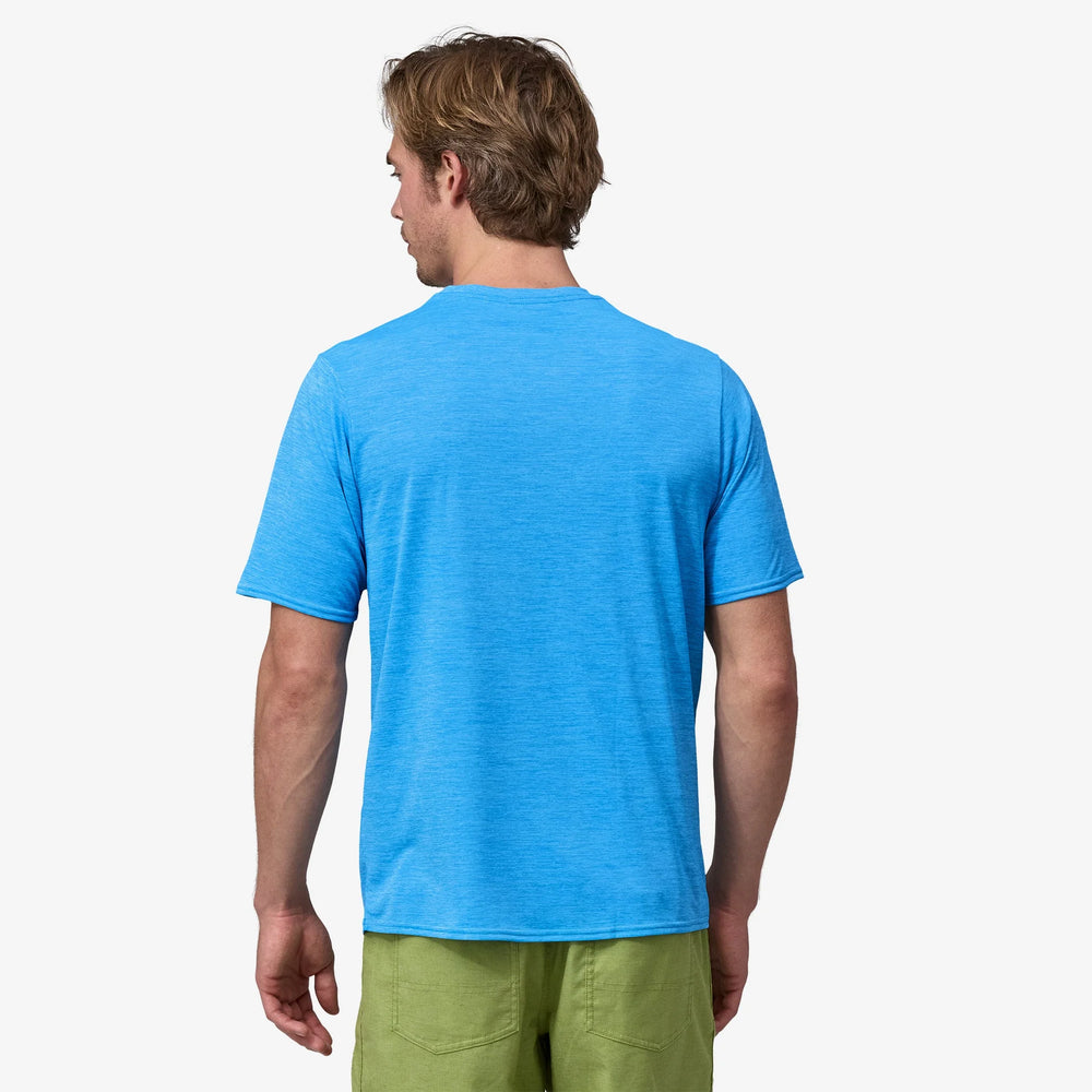 
                  
                    Camiseta Cap Cool Daily Graphic Shirt - Lands - Clean Climb Bloom-Vessel Blue X-Dye
                  
                